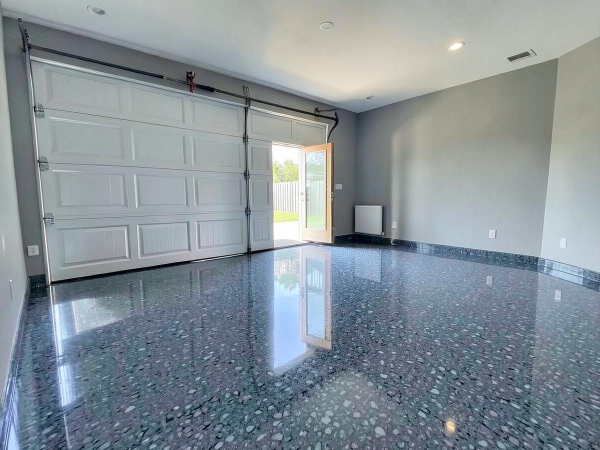 Finished garage floor with a glossy flake coating